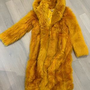 Michael Kors collection yellow fox coat new with tags . Maxi length with hood .